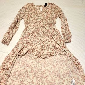 Long sleeve romper with high low skirt